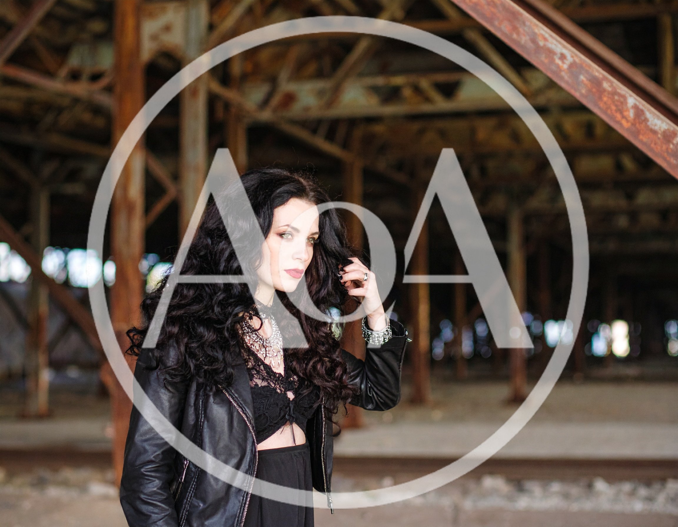 Gothic Woman Posing In Abandoned Industrial Warehouse