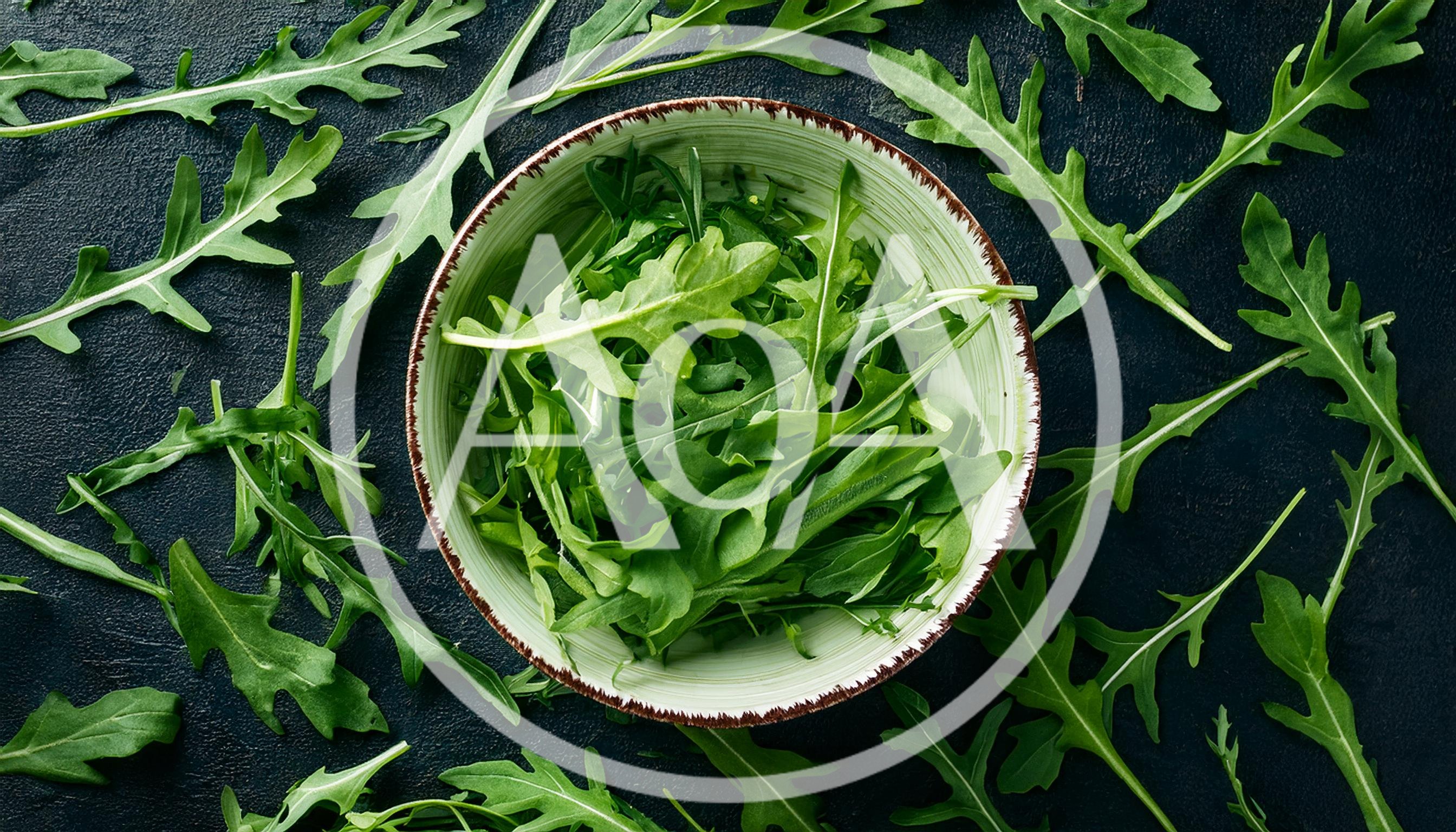 Fresh Arugula Leaves In A Ceramic Bowl