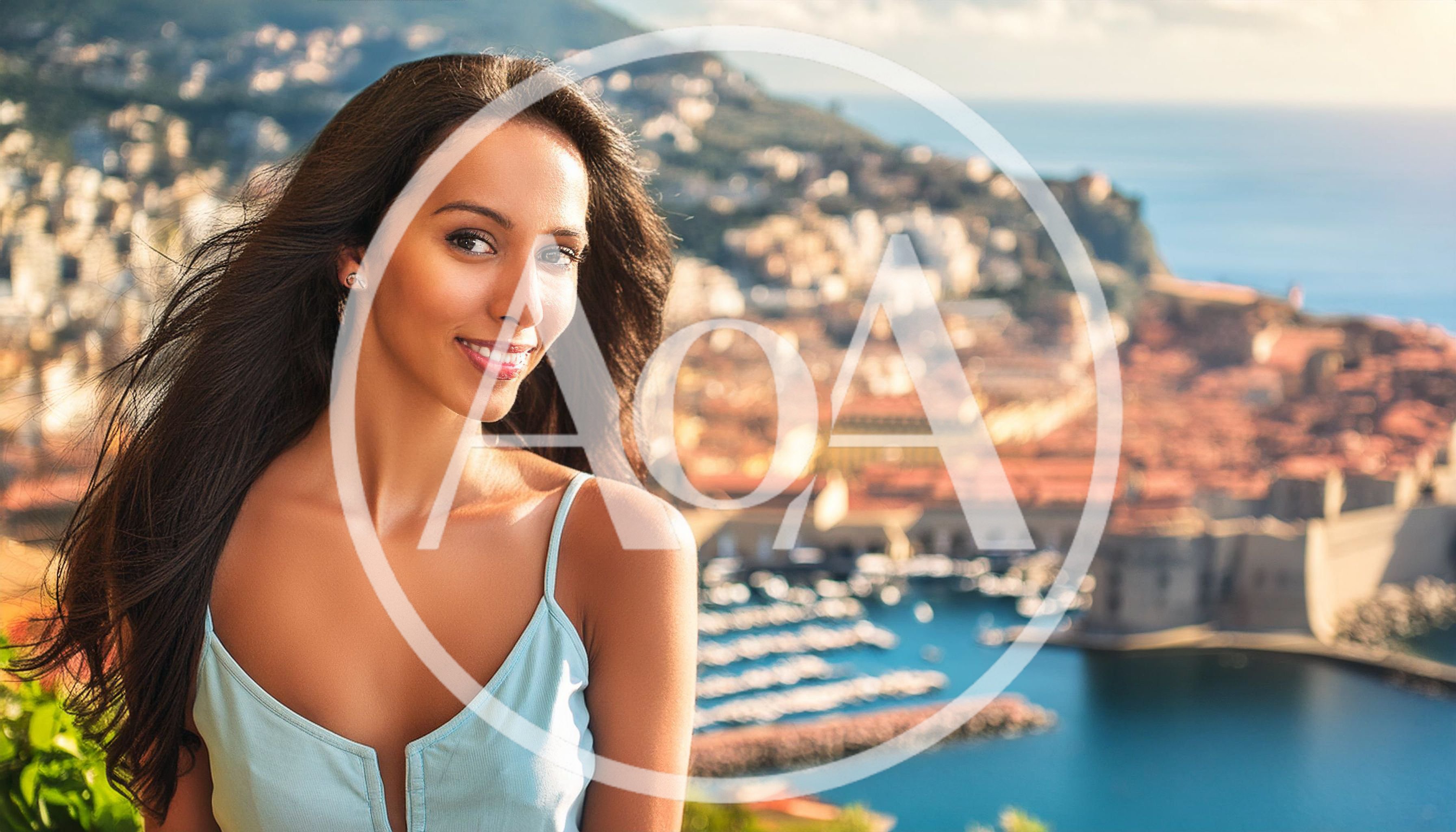 Young Woman Smiling Overlooking The Mediterranean Coastline