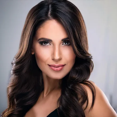 Portrait Of A Beautiful Woman With Long Wavy Hair