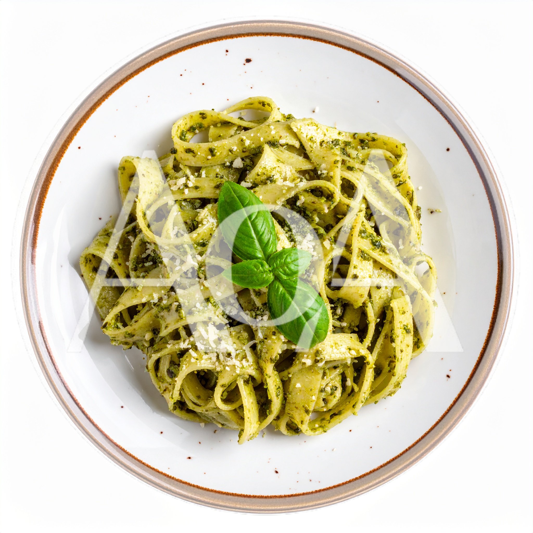 Top View Of Tagliatelle Pasta With Pesto Sauce