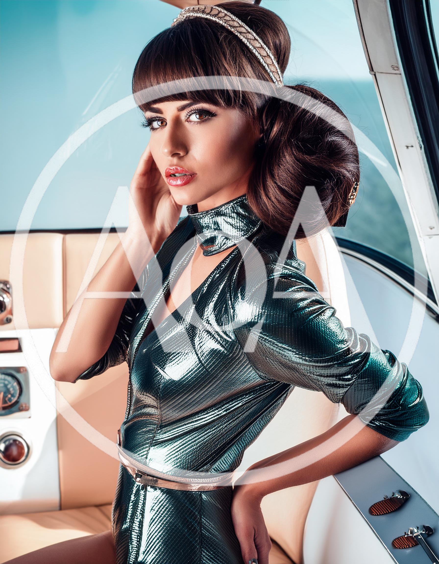 Fashionable Woman Posing Inside A Private Jet Cabin