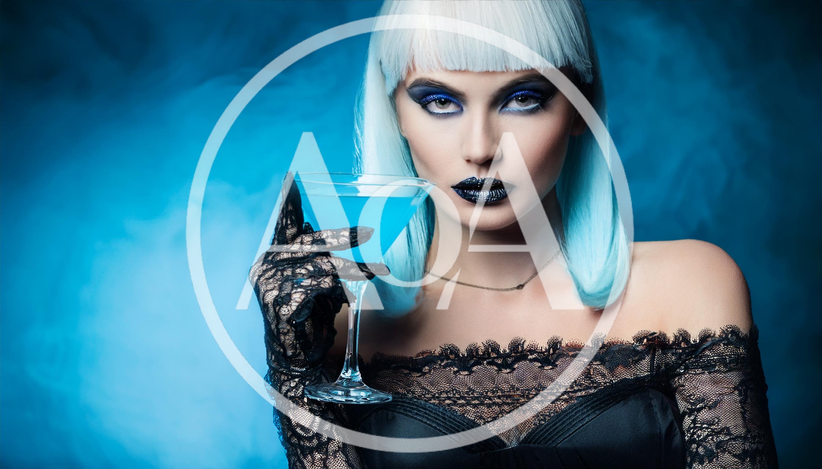 Fashionable Woman With Blue Hair Holding A Martini Glass