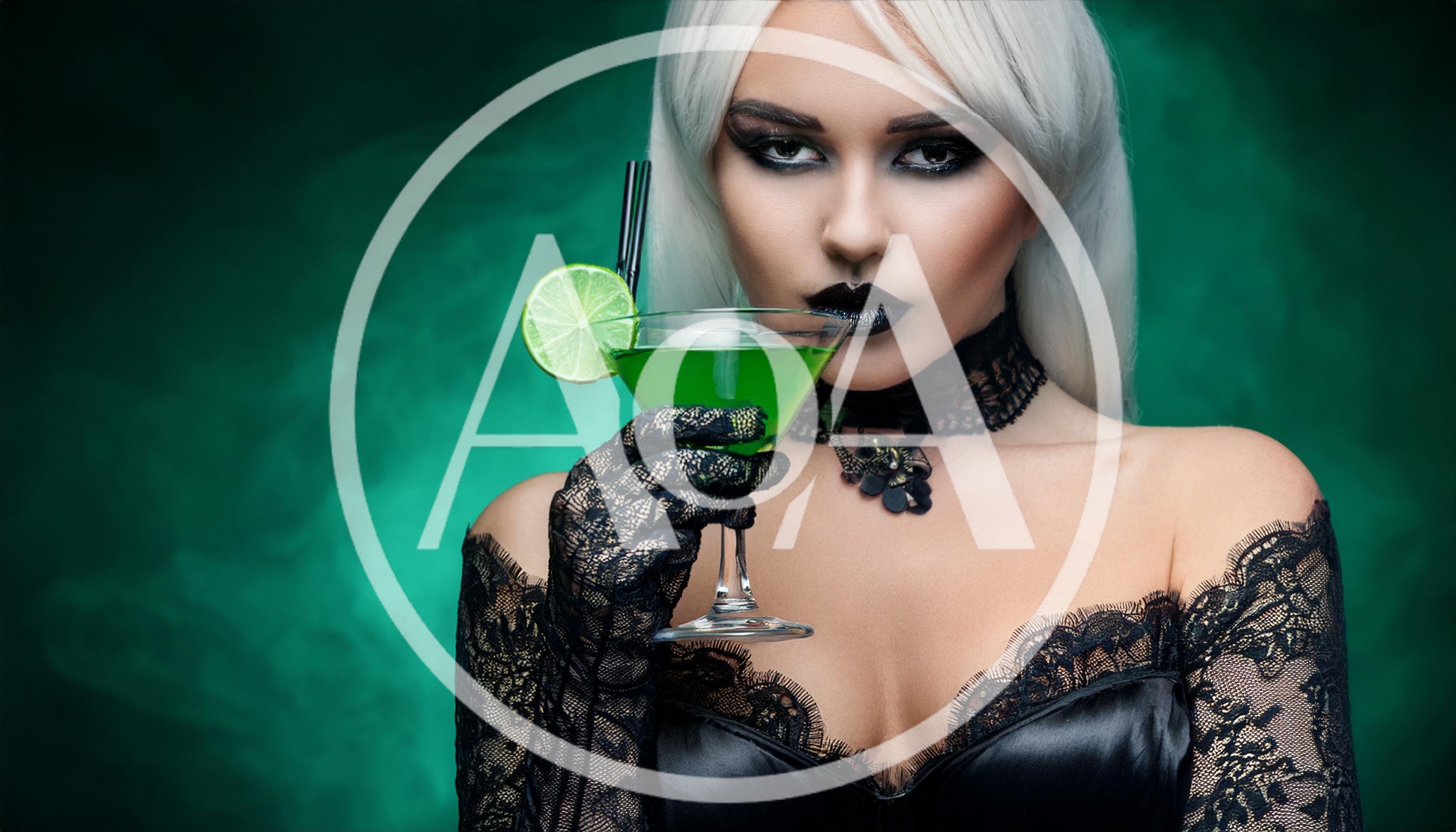 Gothic Woman Holding A Green Cocktail