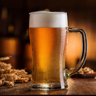 Cold Glass Mug Of Golden Beer With Foam