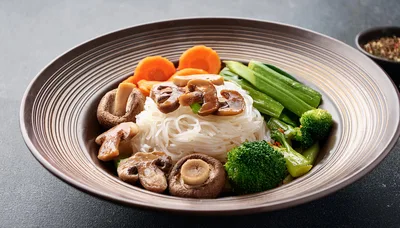 Bowl Of Healthy Vegetable Stir Fry With Rice Noodles