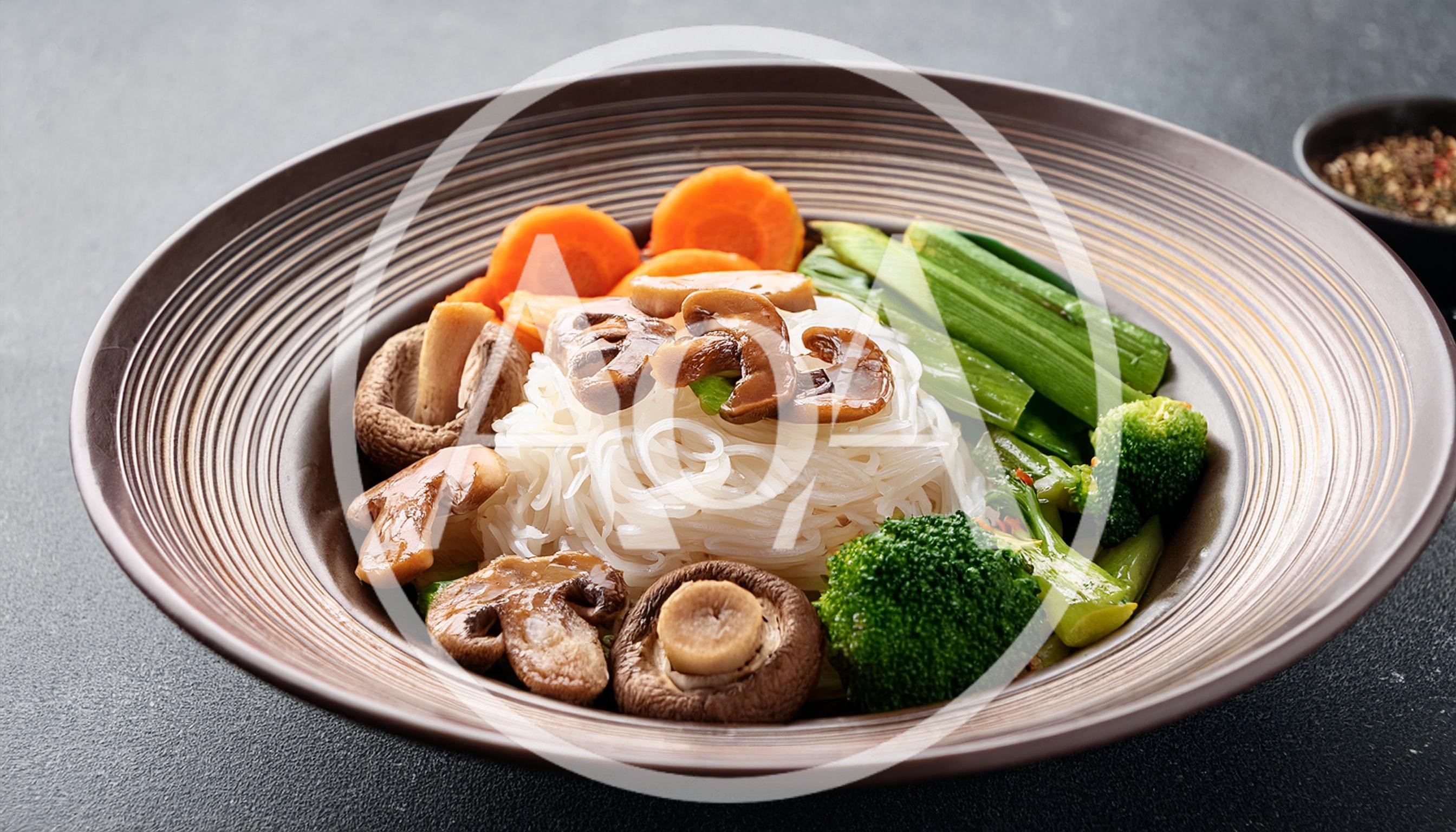 Bowl Of Healthy Vegetable Stir Fry With Rice Noodles