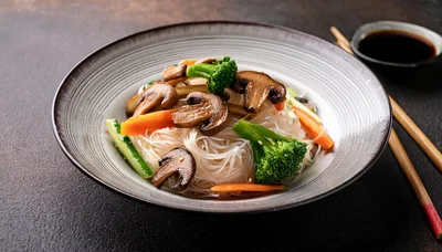 Stir Fried Glass Noodles With Vegetables And Mushrooms