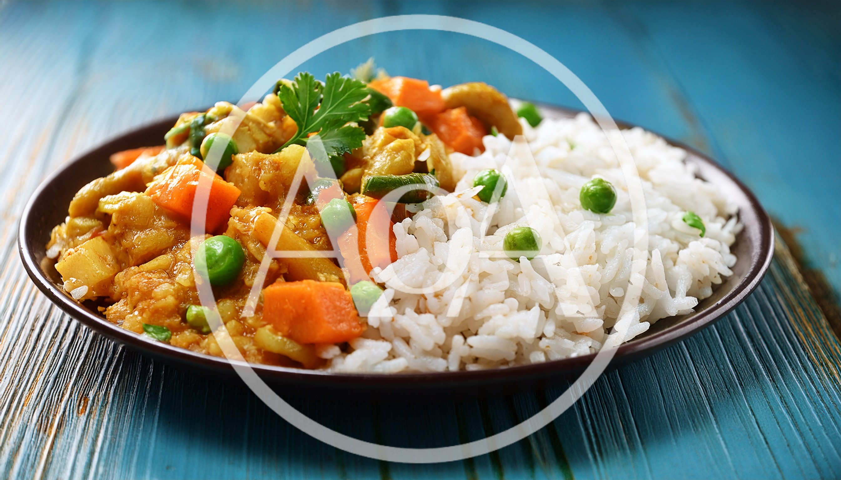 Vegetable Curry With Steamed White Rice On Plate