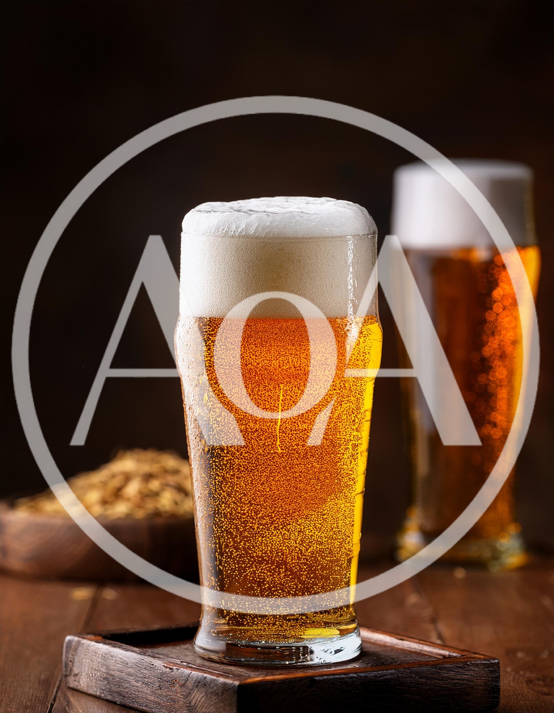 Two Glasses Of Golden Beer On A Wooden Table
