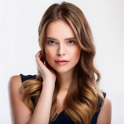 Portrait Of A Beautiful Young Woman With Wavy Hair