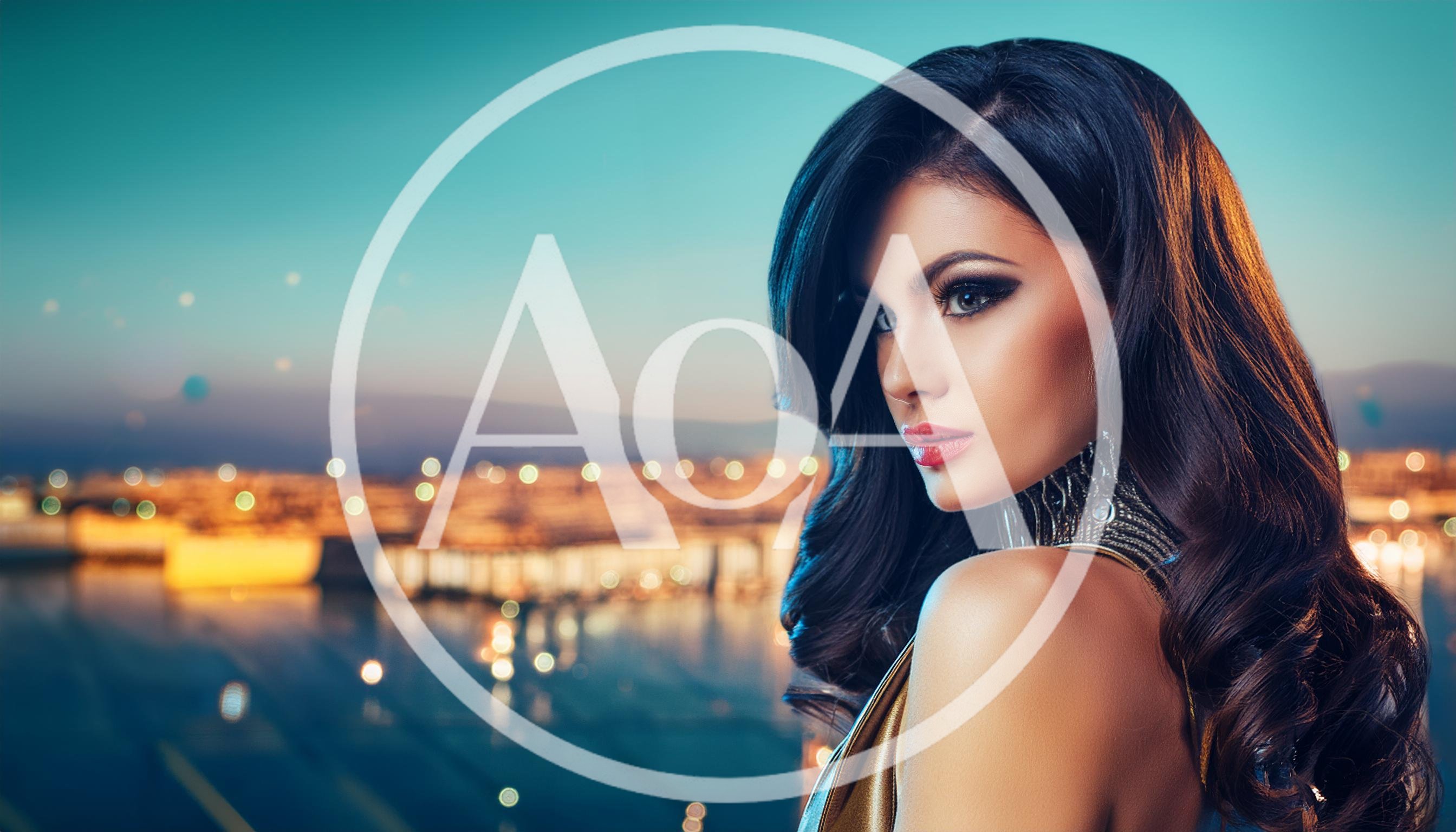 Glamorous Woman With Wavy Hair Looking Over Shoulder