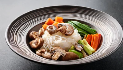 Bowl Of Glass Noodles With Mushrooms And Vegetables