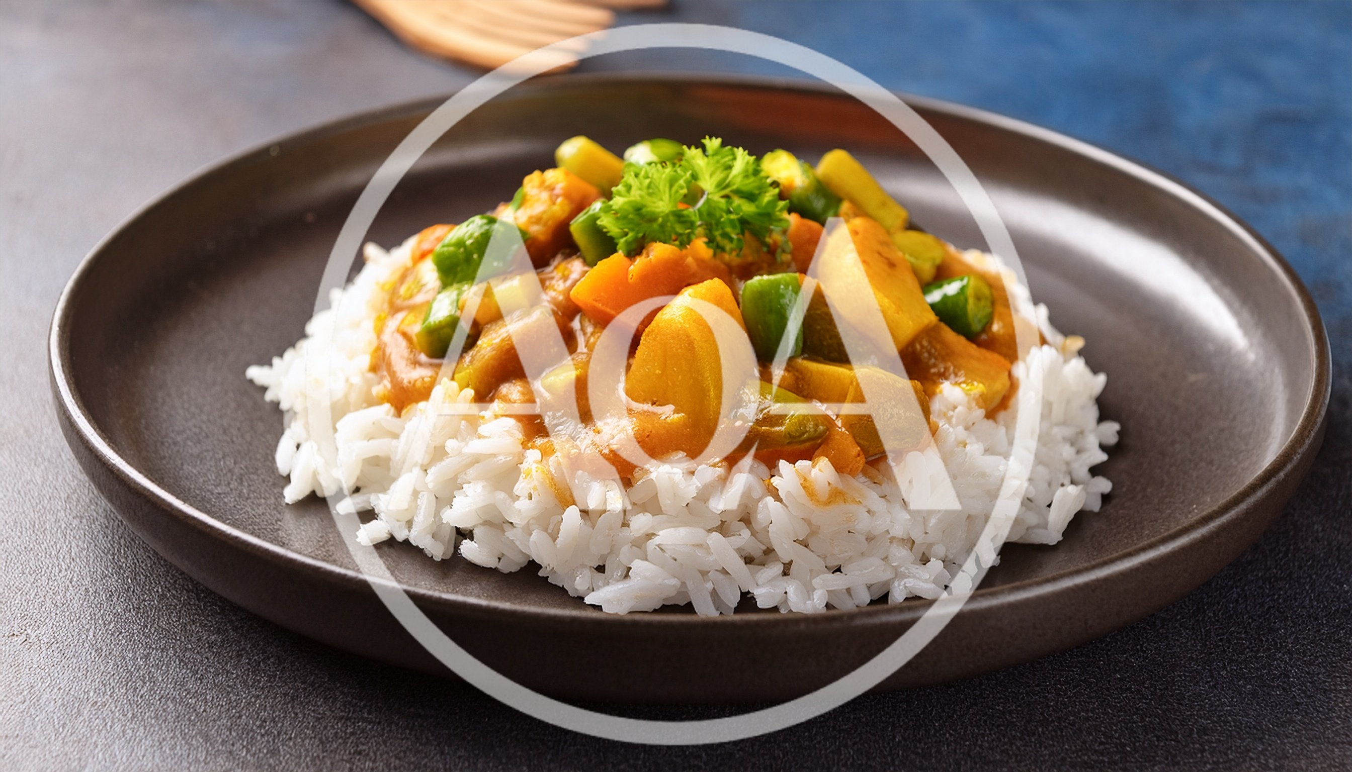 Vegetable Curry Served Over Steamed White Rice