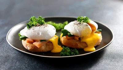 Two Eggs Benedict With Smoked Salmon On Toasted Bread