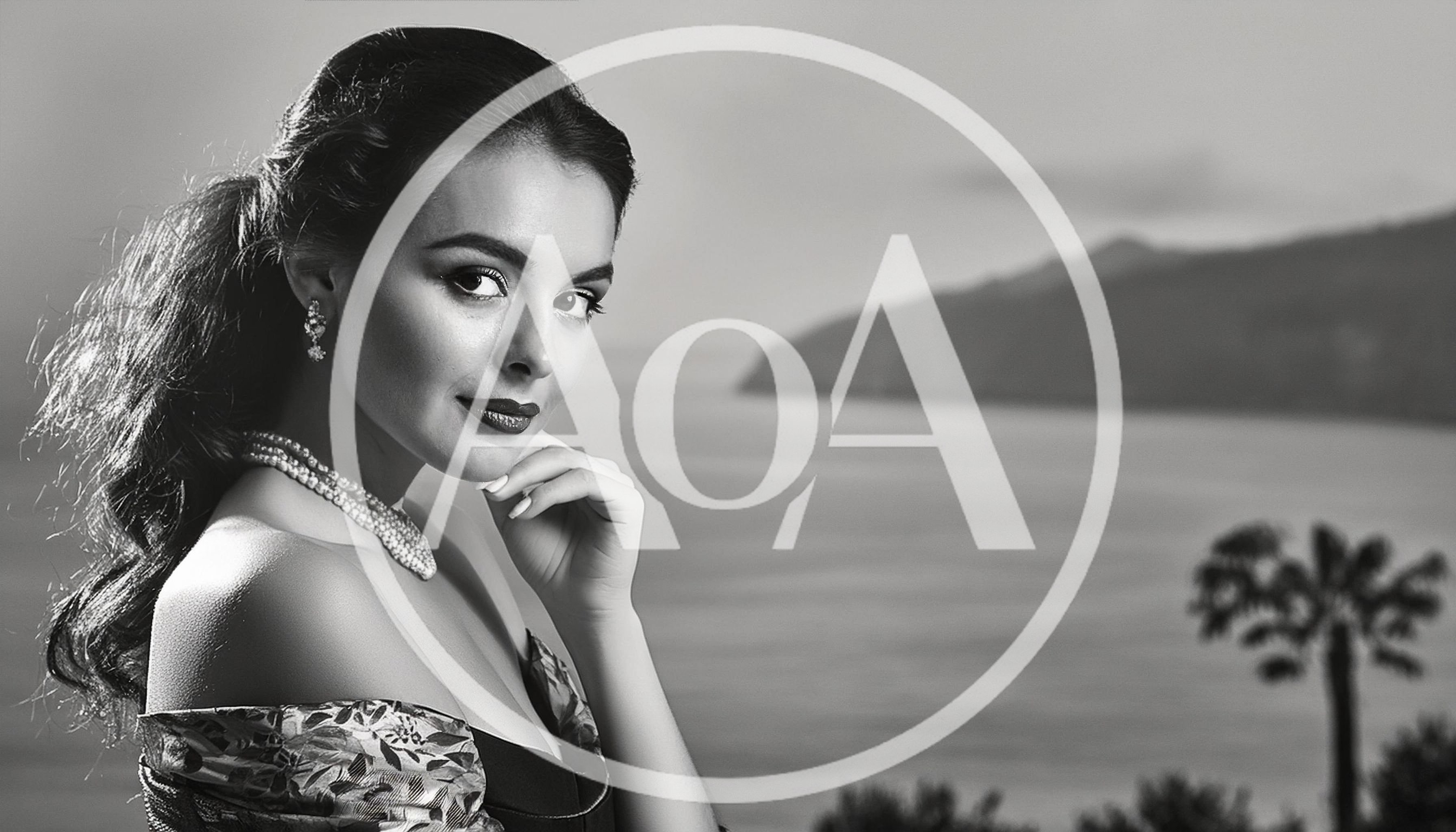 Elegant Woman Posing With Pearl Necklace By The Sea