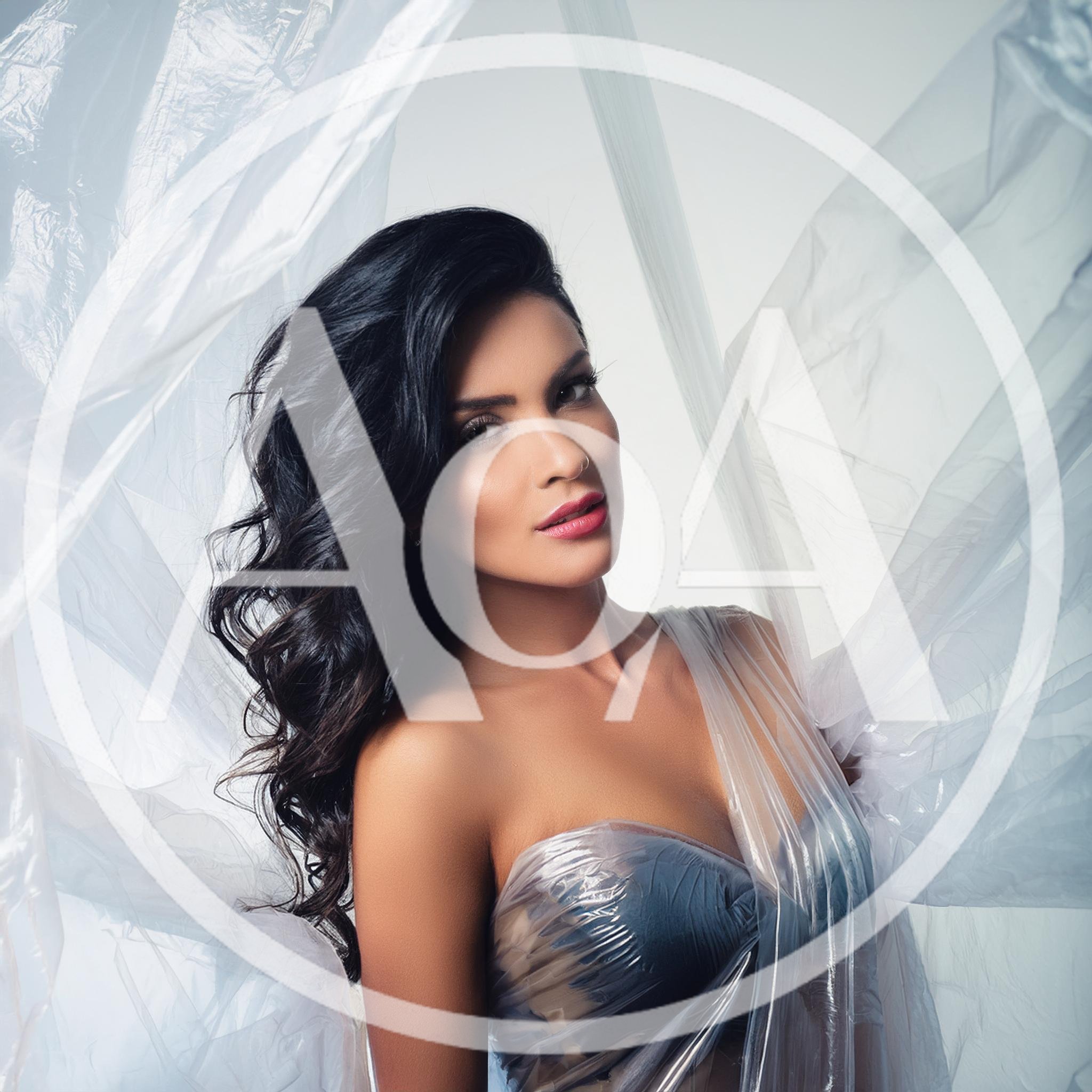 Portrait Of A Beautiful Woman Wrapped In Plastic Film