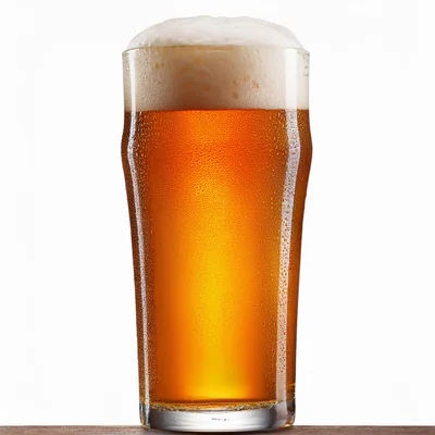 Cold Pint Of Golden Beer With Frothy Head