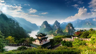 Traditional Chinese Pagoda Overlooking Misty River and Mountains