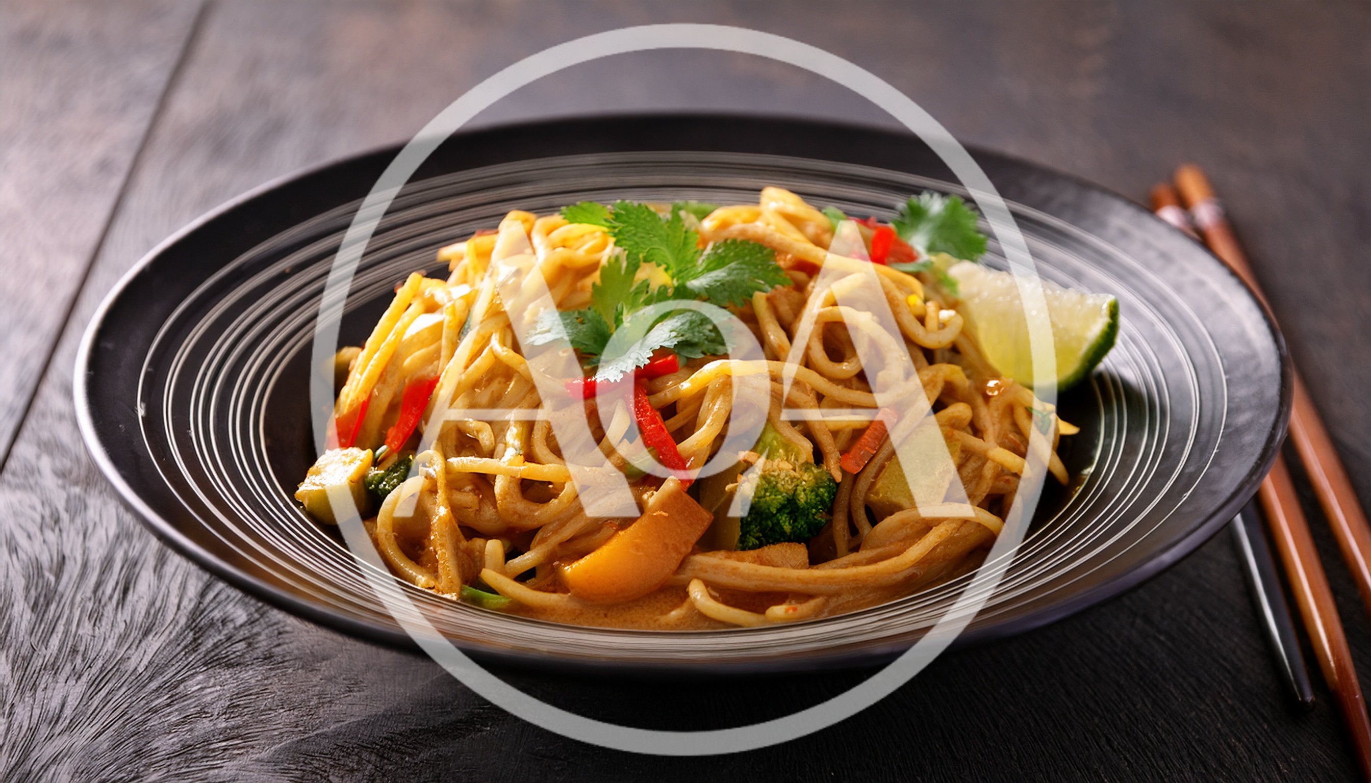 Bowl Of Spicy Thai Peanut Noodles With Vegetables
