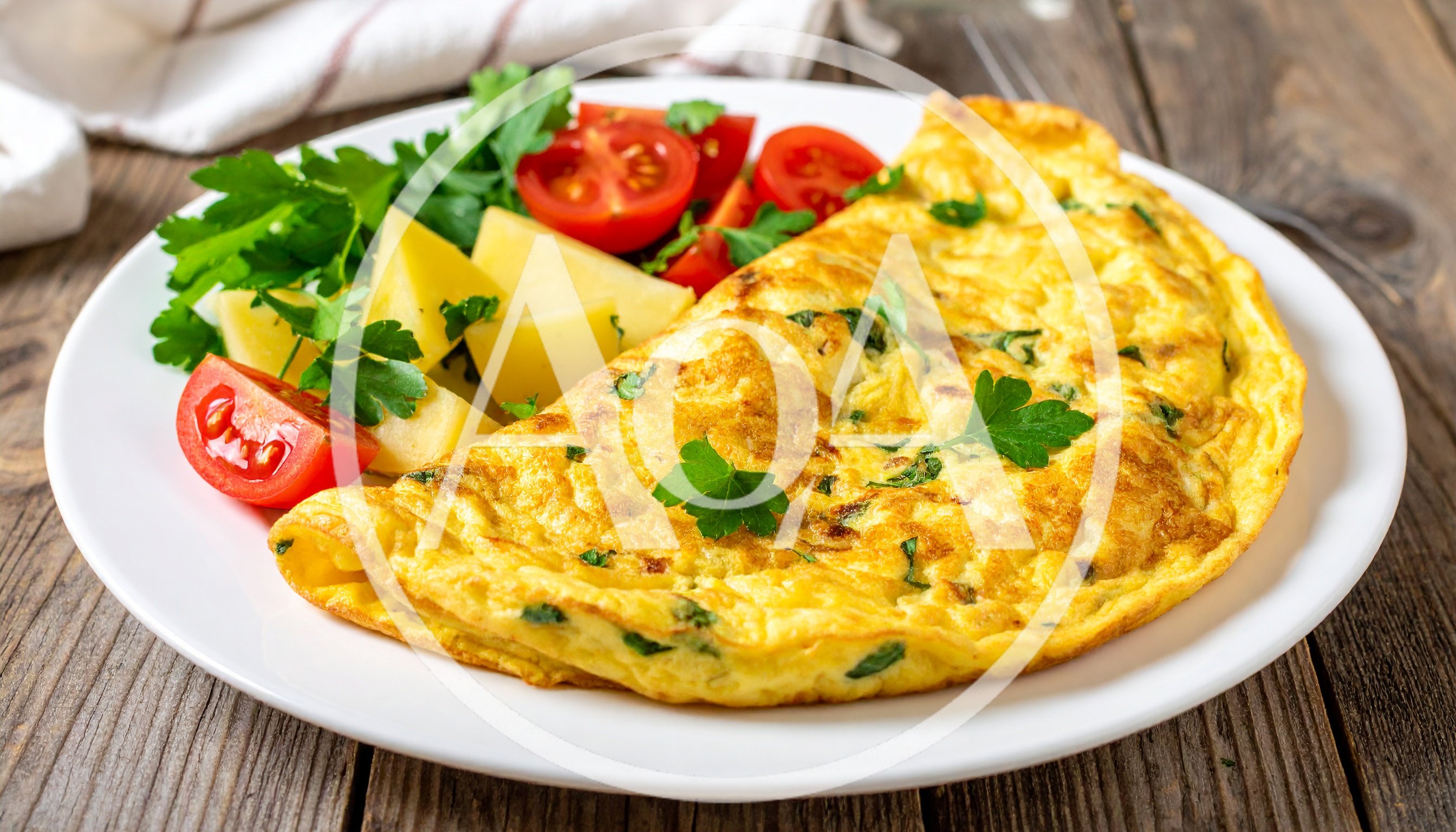 Omelet with Fresh Parsley and Tomatoes on a Plate