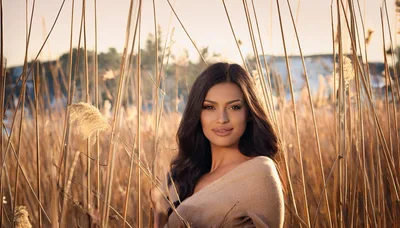 Portrait Of A Beautiful Woman In Tall Grass