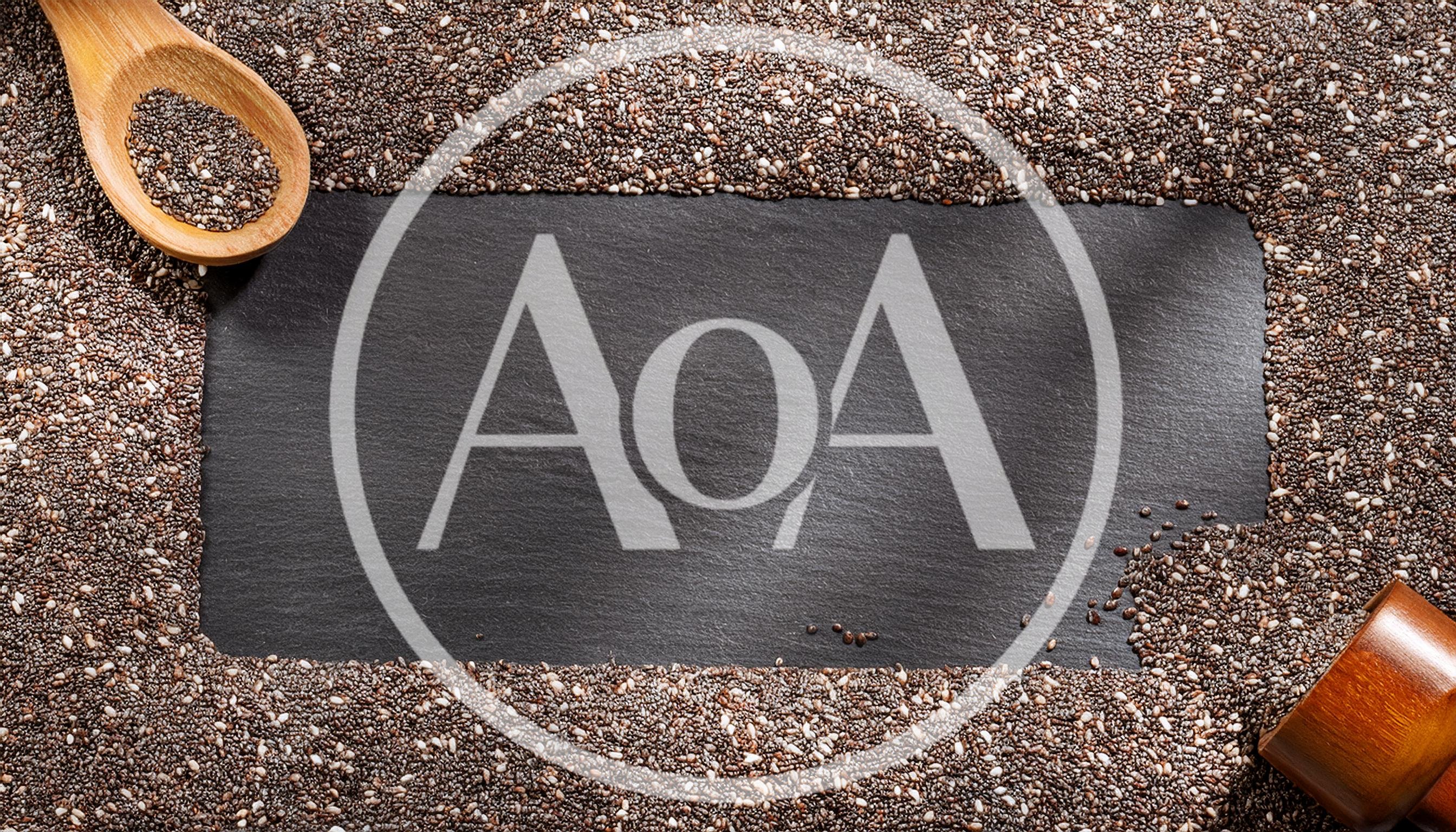 Chia Seeds Bordering A Dark Slate Background