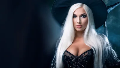 Beautiful Blonde Witch Wearing A Black Corset And Hat