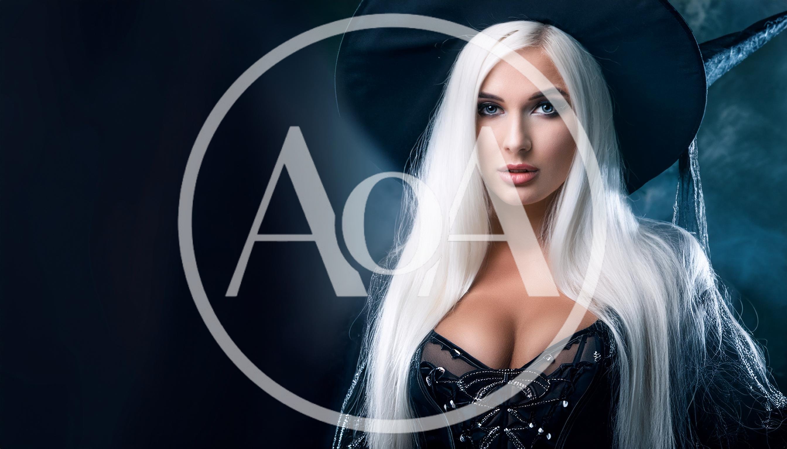 Beautiful Blonde Witch Wearing A Black Corset And Hat