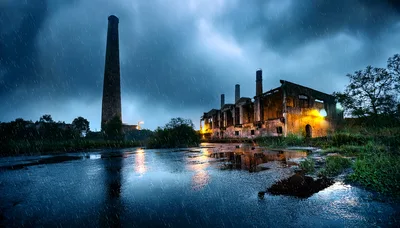 Abandoned Industrial Factory Ruins Under Stormy Rain