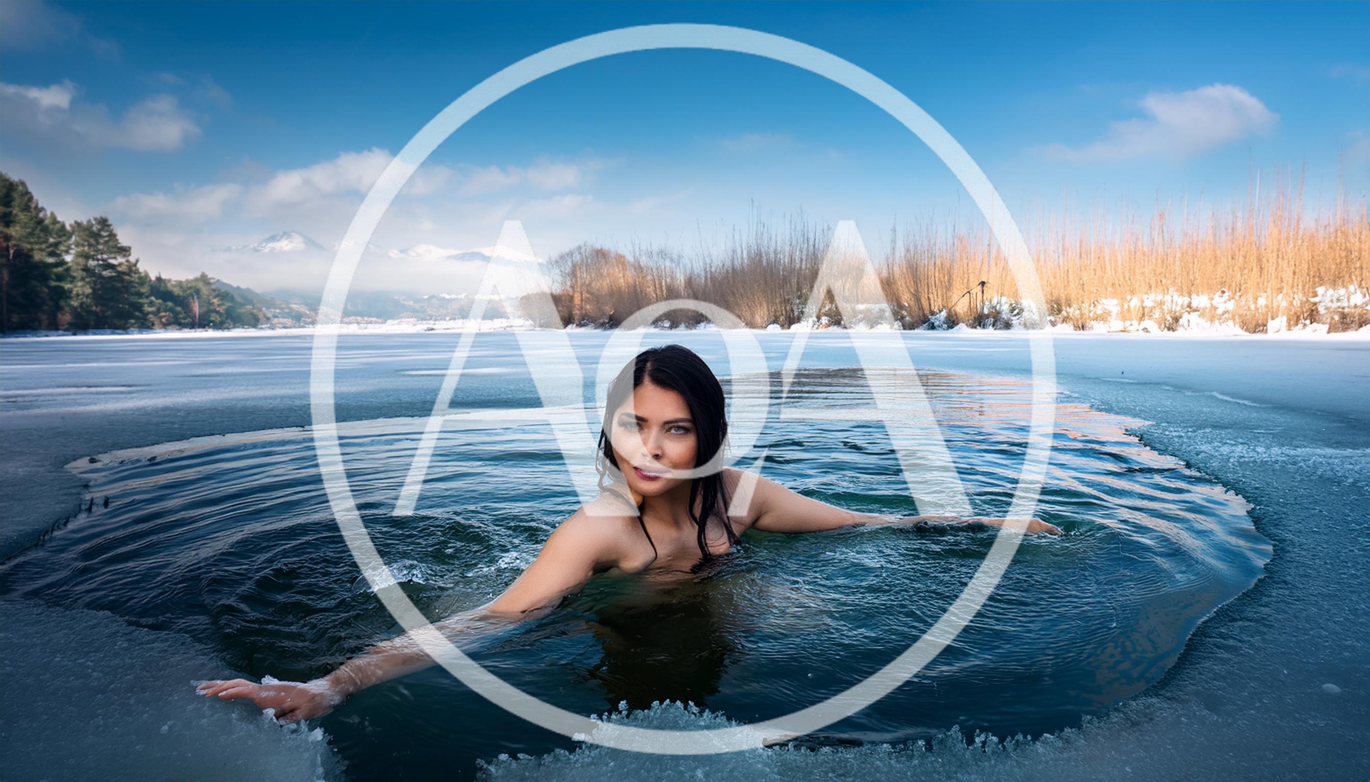 Woman Swimming In A Frozen Lake Hole