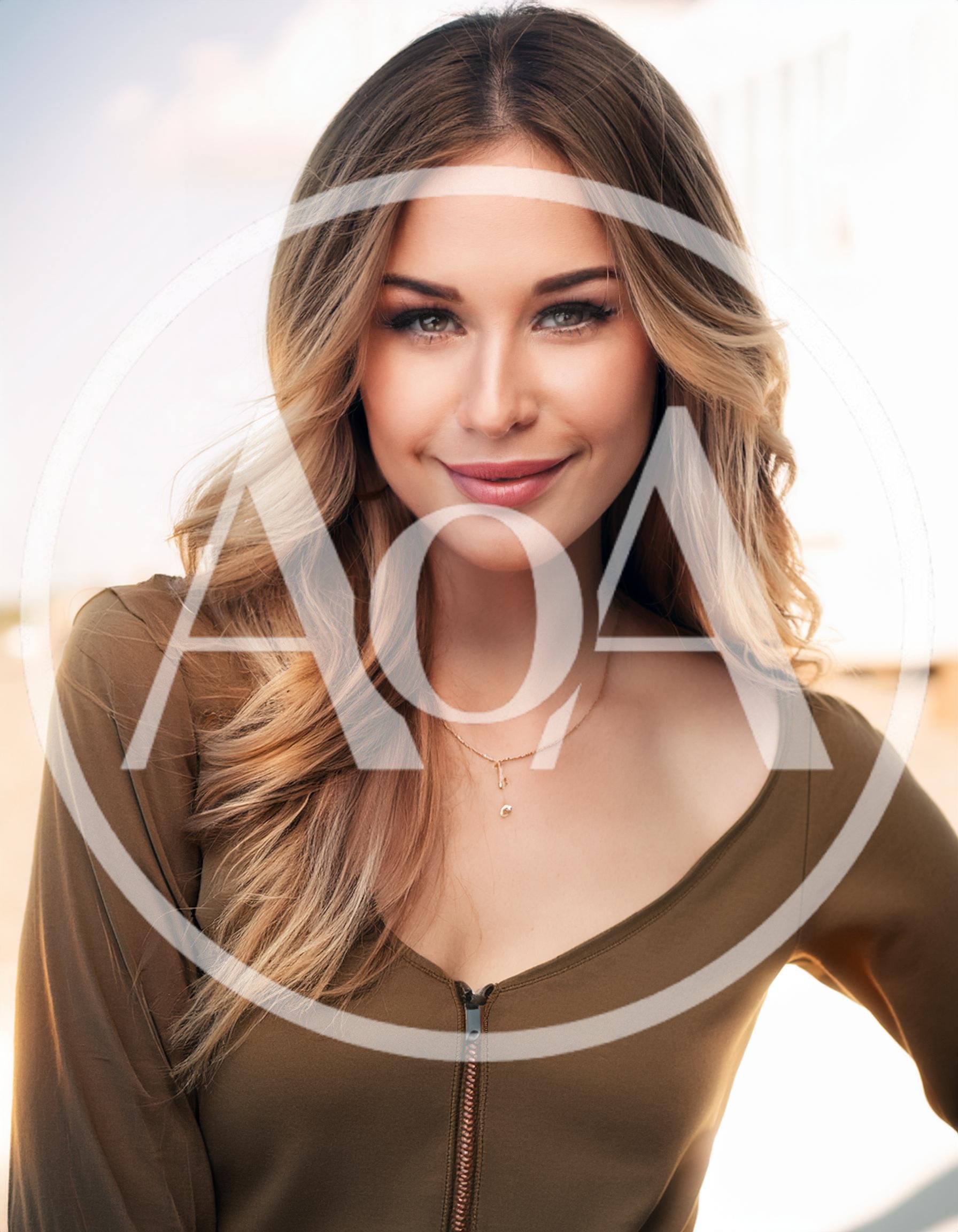 Portrait Of A Beautiful Young Woman With Blonde Hair