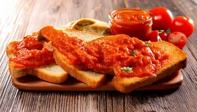 Toasted Bread Slices Topped With Tomato Spread
