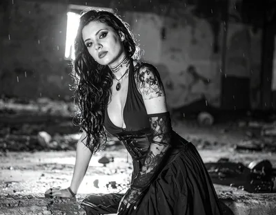 Gothic Woman Posing in Abandoned Building