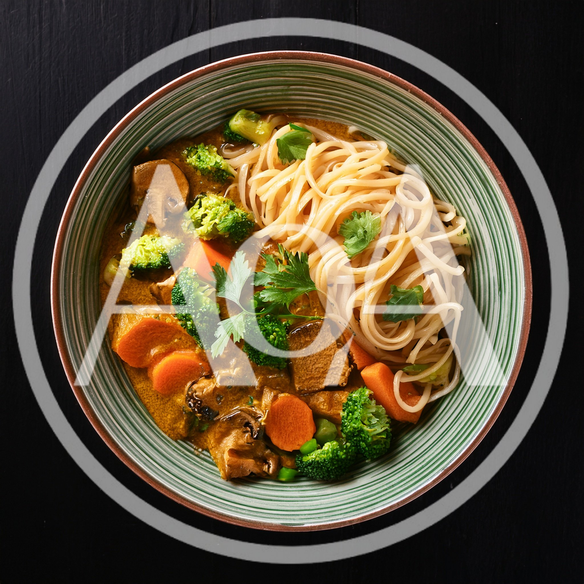 Bowl Of Thai Green Curry With Noodles