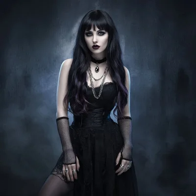 Gothic Woman With Long Dark Hair In Studio Portrait