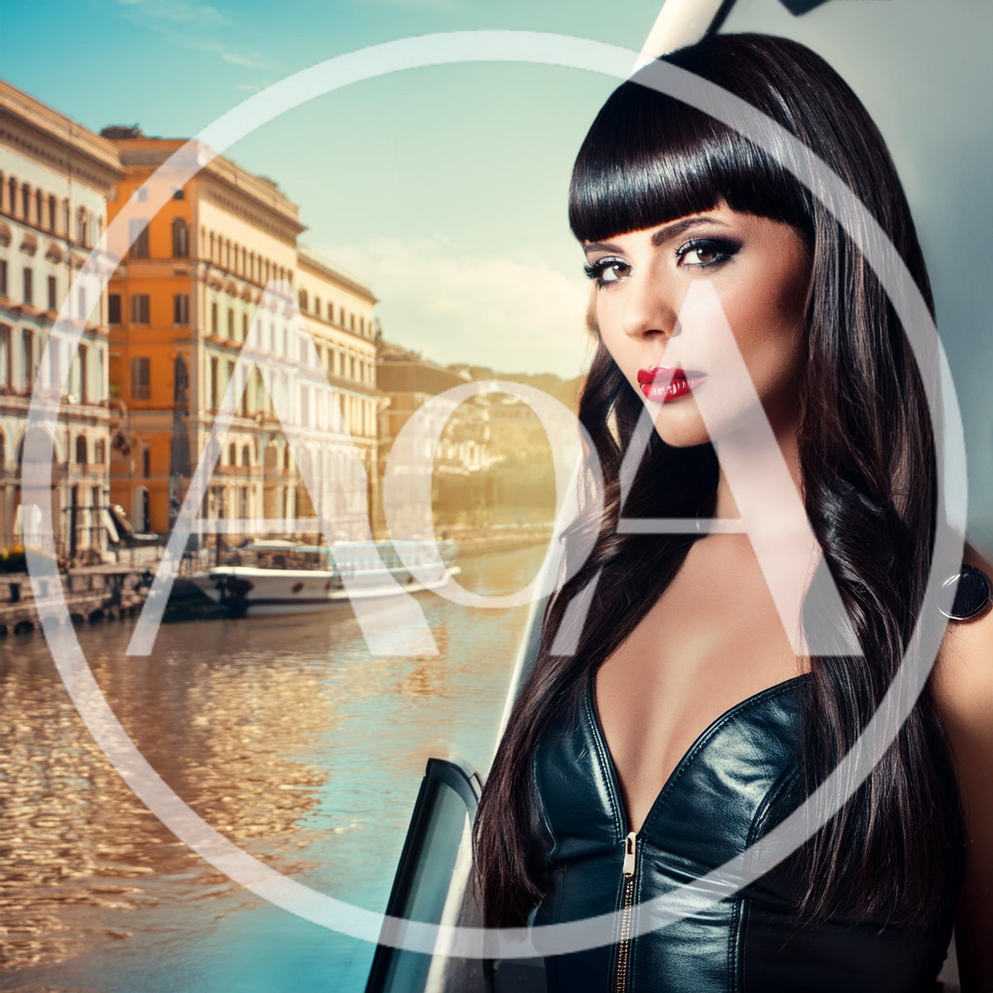 Elegant Woman With Dark Hair Posing By A Canal