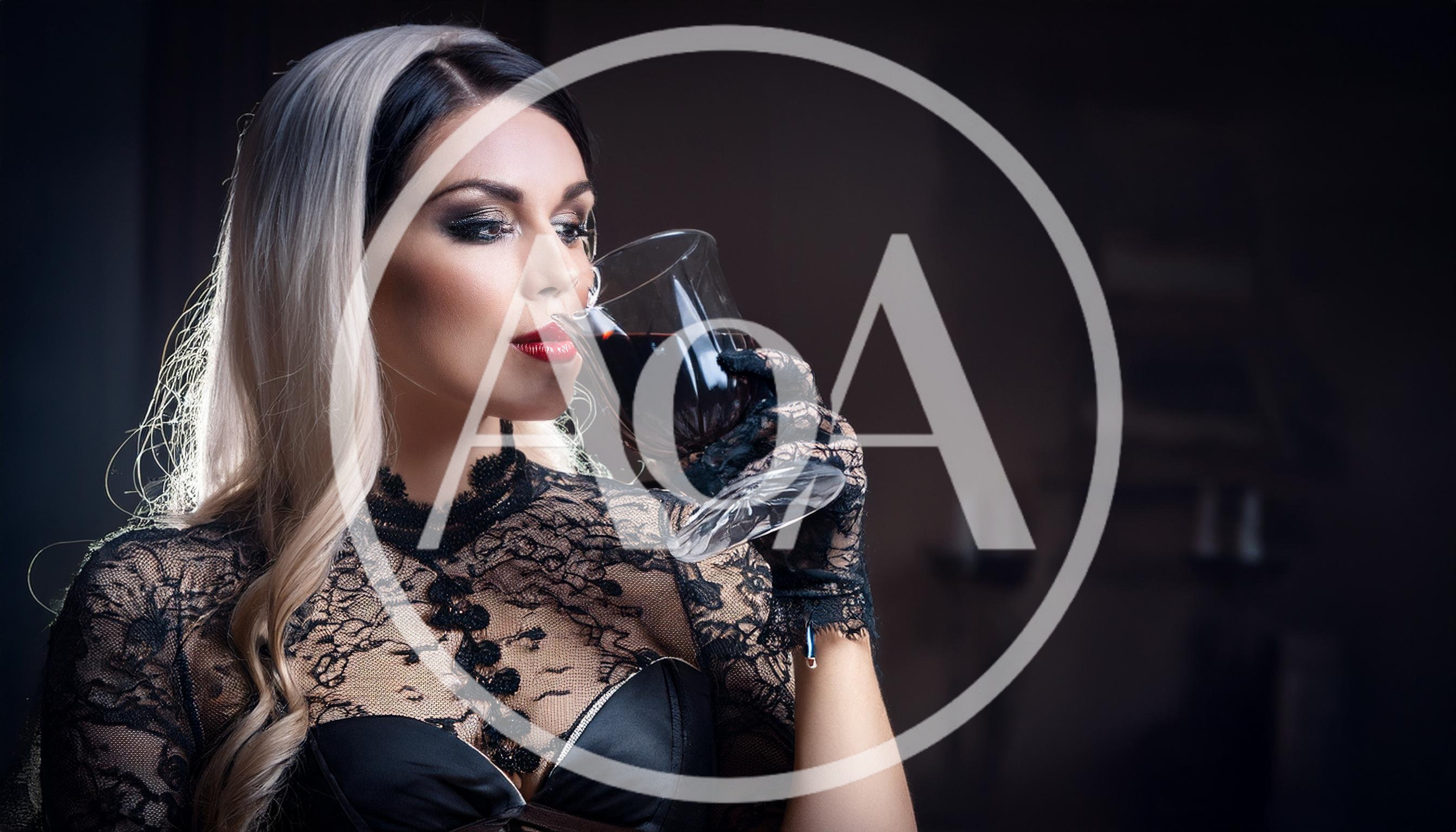 Elegant Woman Drinking Red Wine In Gothic Lace Attire