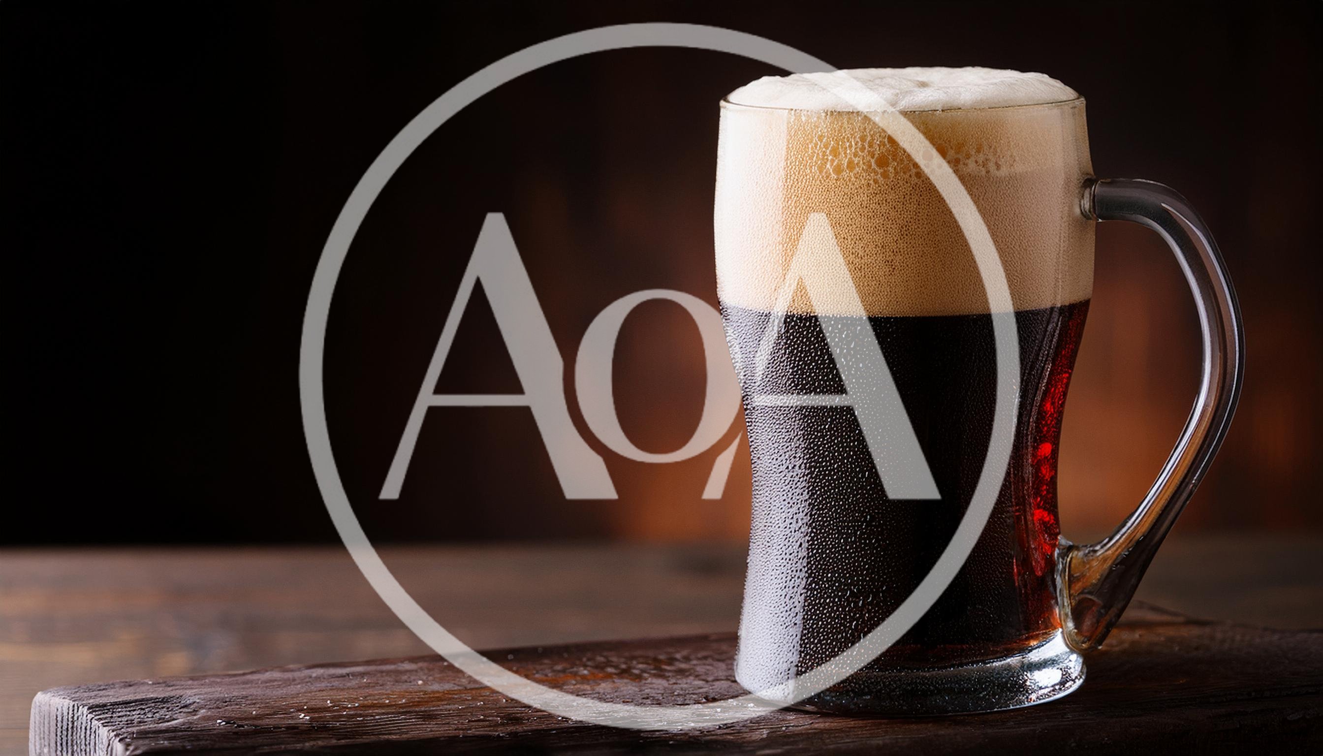 Cold Glass Of Dark Stout Beer On Wooden Table