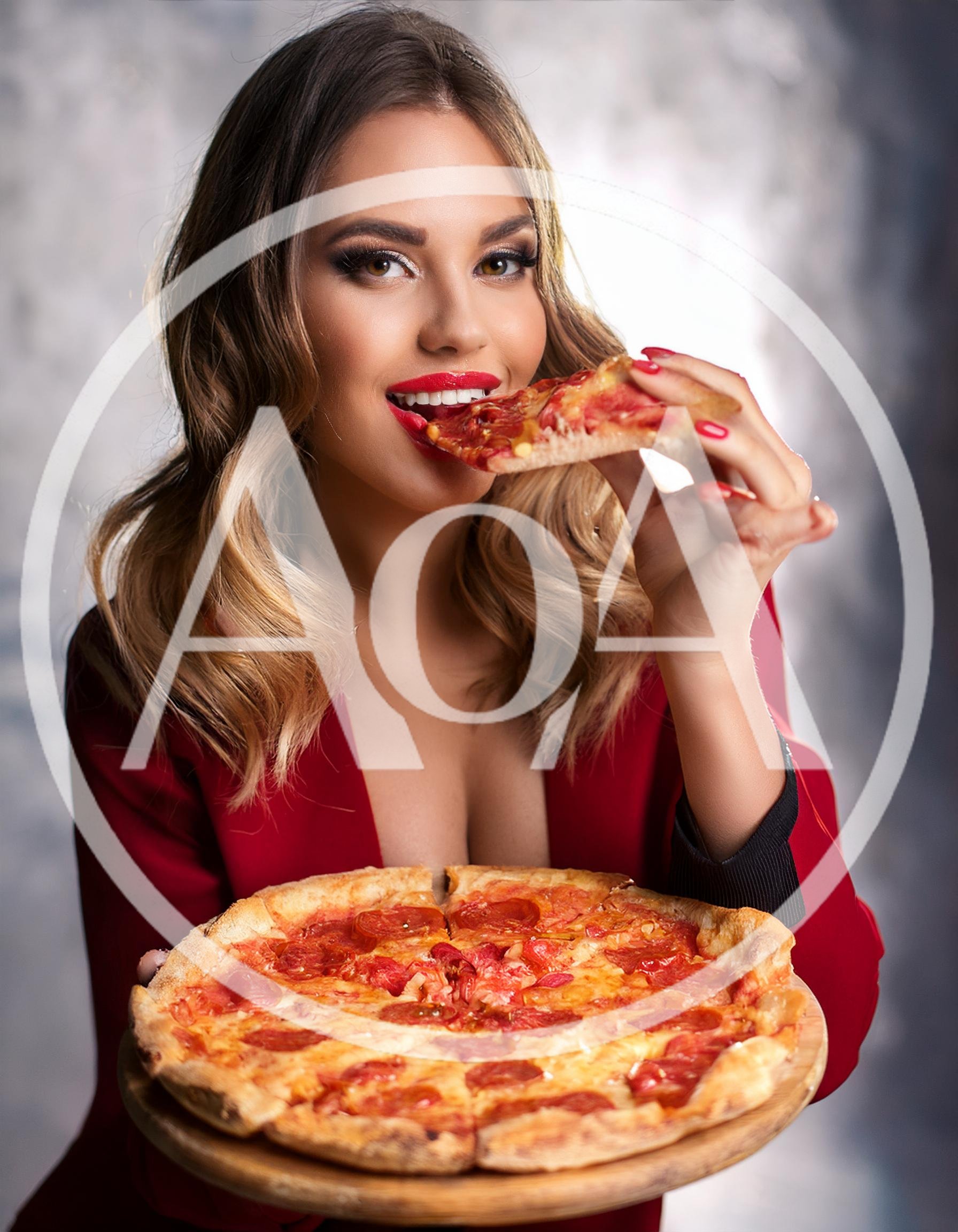 Beautiful Woman Eating Pepperoni Pizza Slice