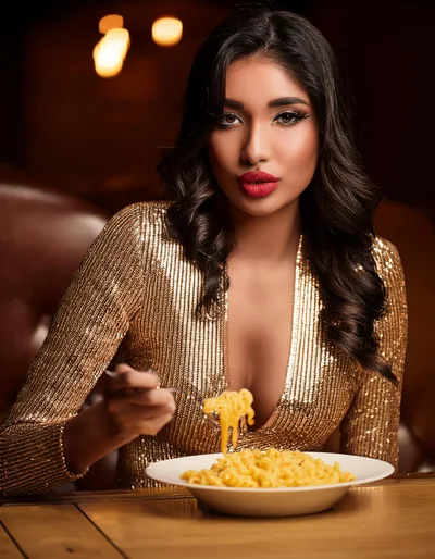 Elegant Woman Eating Pasta In A Luxury Restaurant