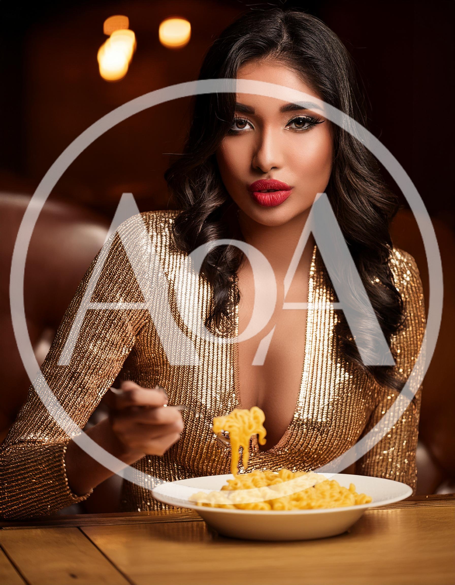 Elegant Woman Eating Pasta In A Luxury Restaurant