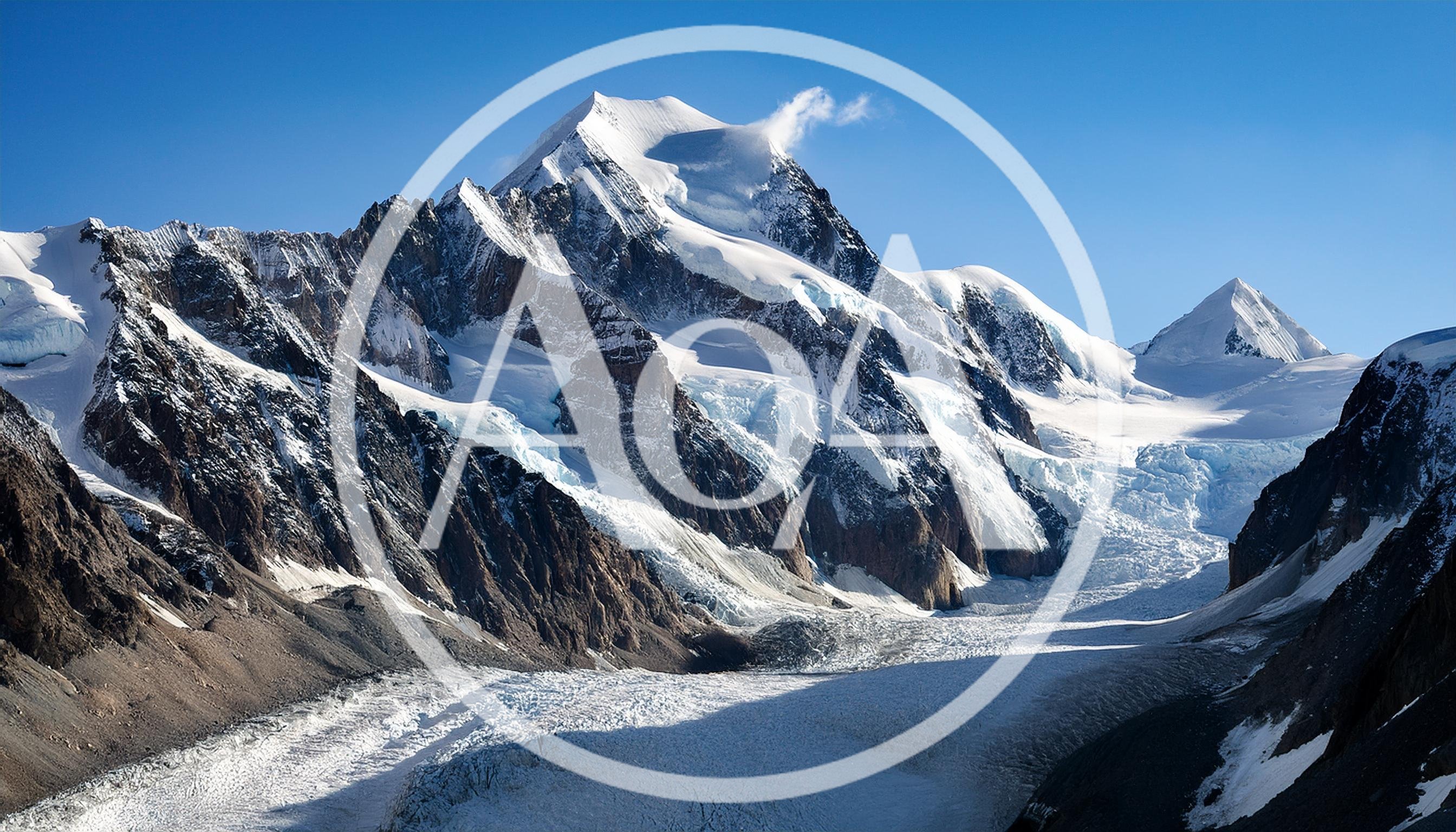 Majestic Snow Covered Mountain Peak And Glacier