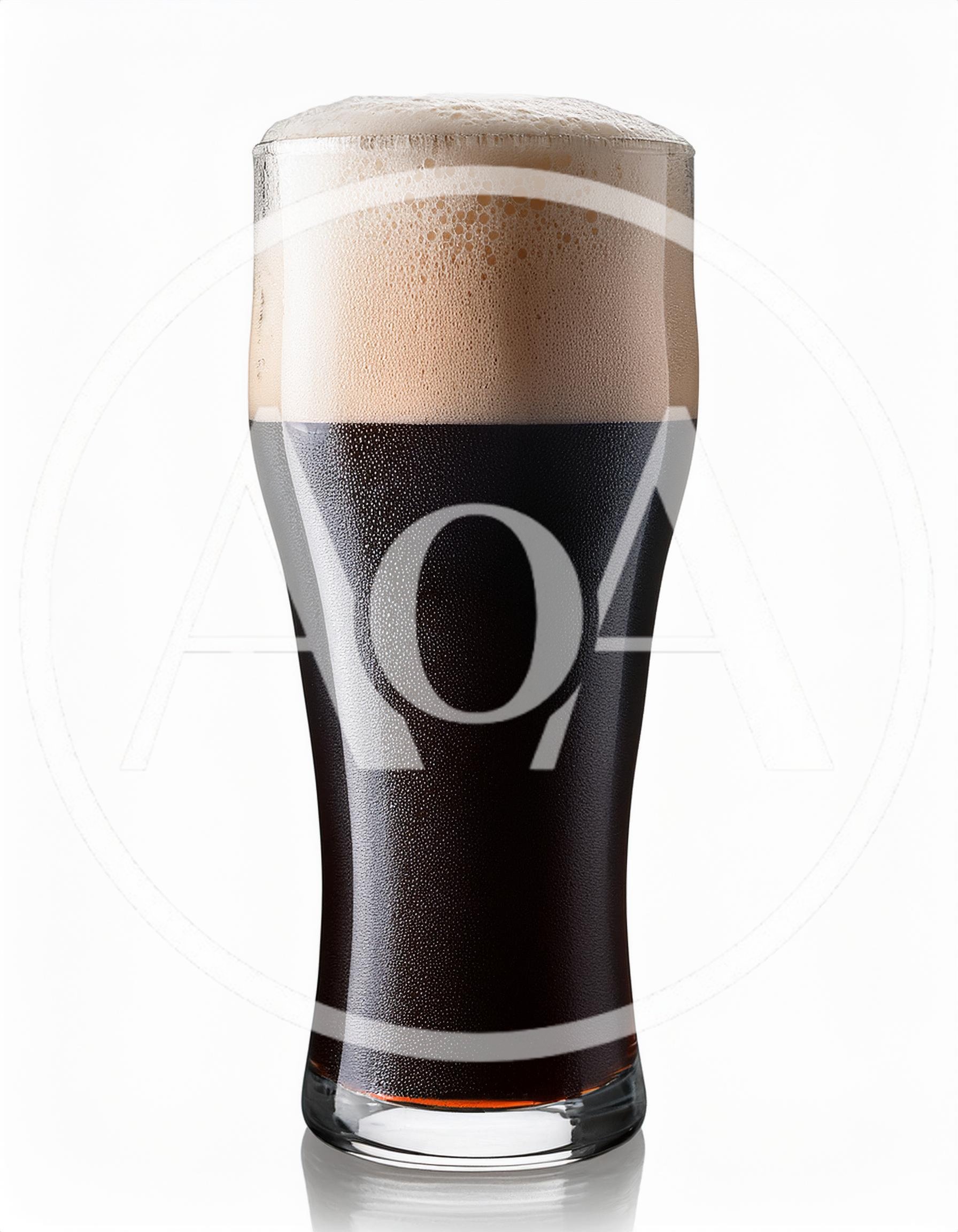 Glass Of Dark Stout Beer With Thick Foam