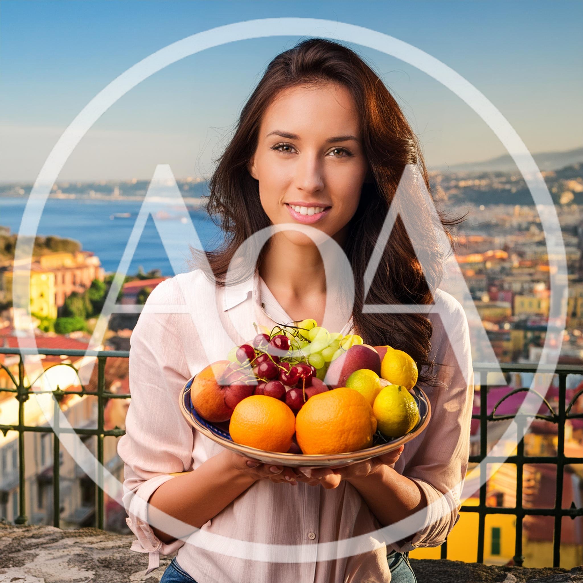 Young Woman Holding A Bowl Of Fresh Fruit