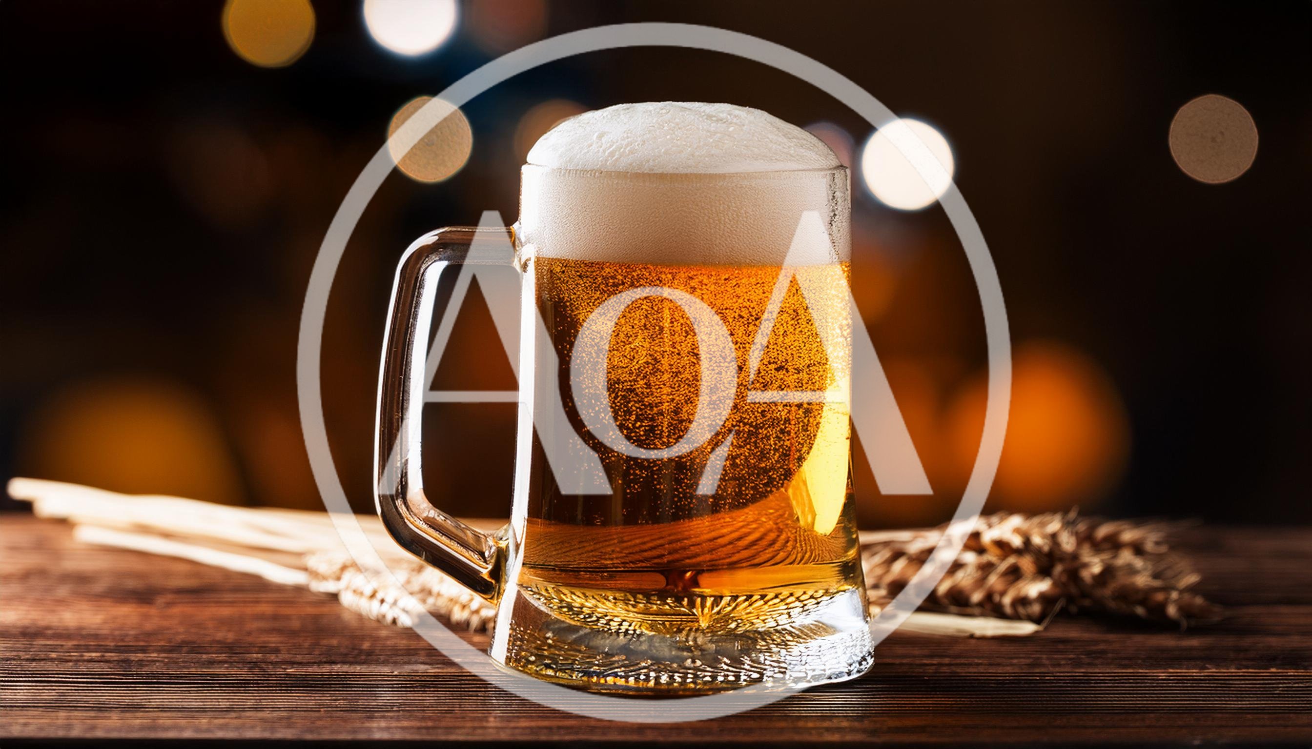 Glass Mug Of Golden Beer With Wheat Stalks