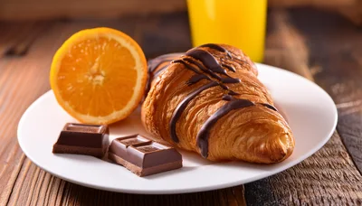 Chocolate Drizzled Croissant With Orange And Chocolate Pieces