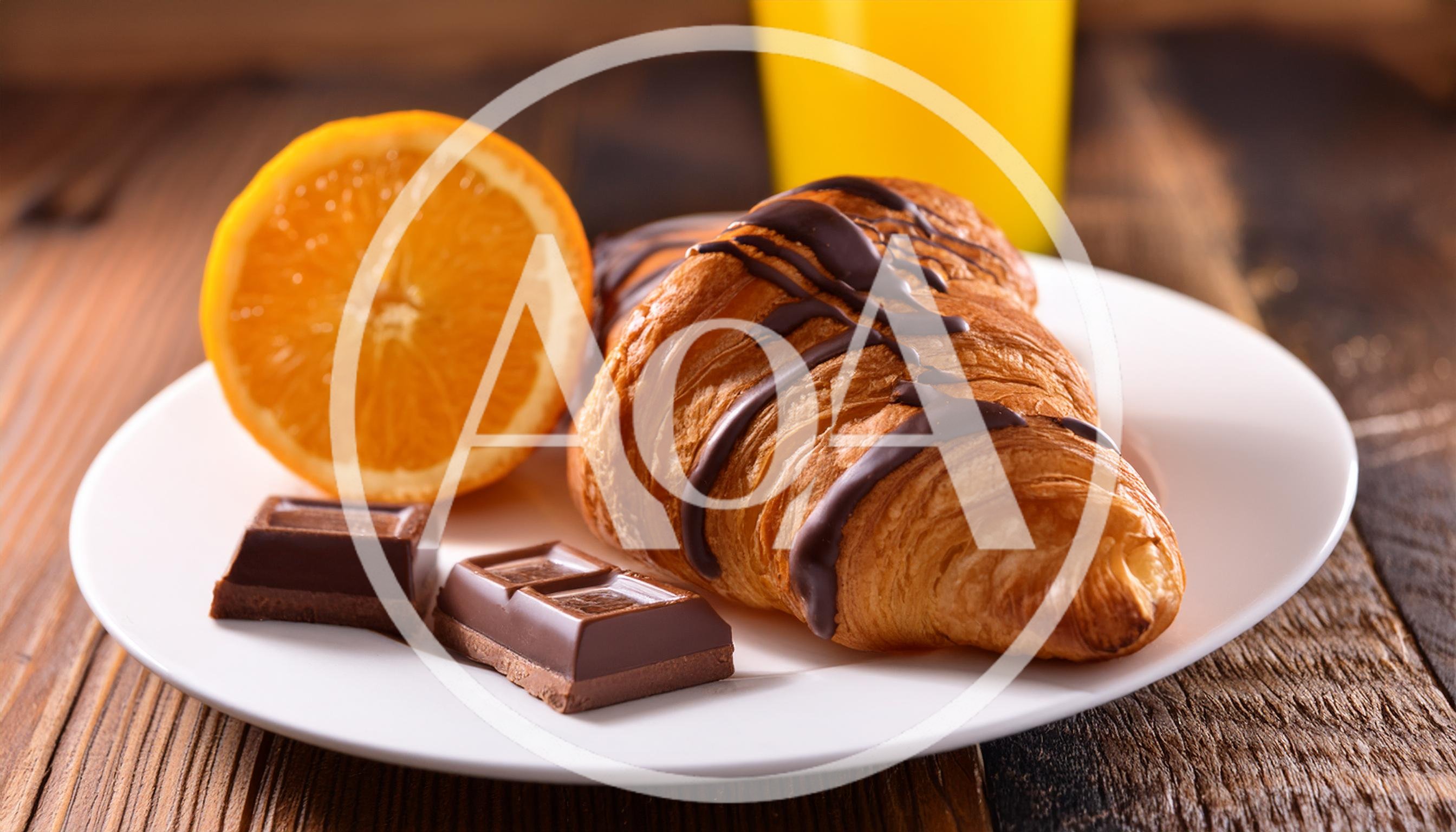 Chocolate Drizzled Croissant With Orange And Chocolate Pieces