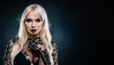 Portrait Of A Blonde Woman In Black Lace