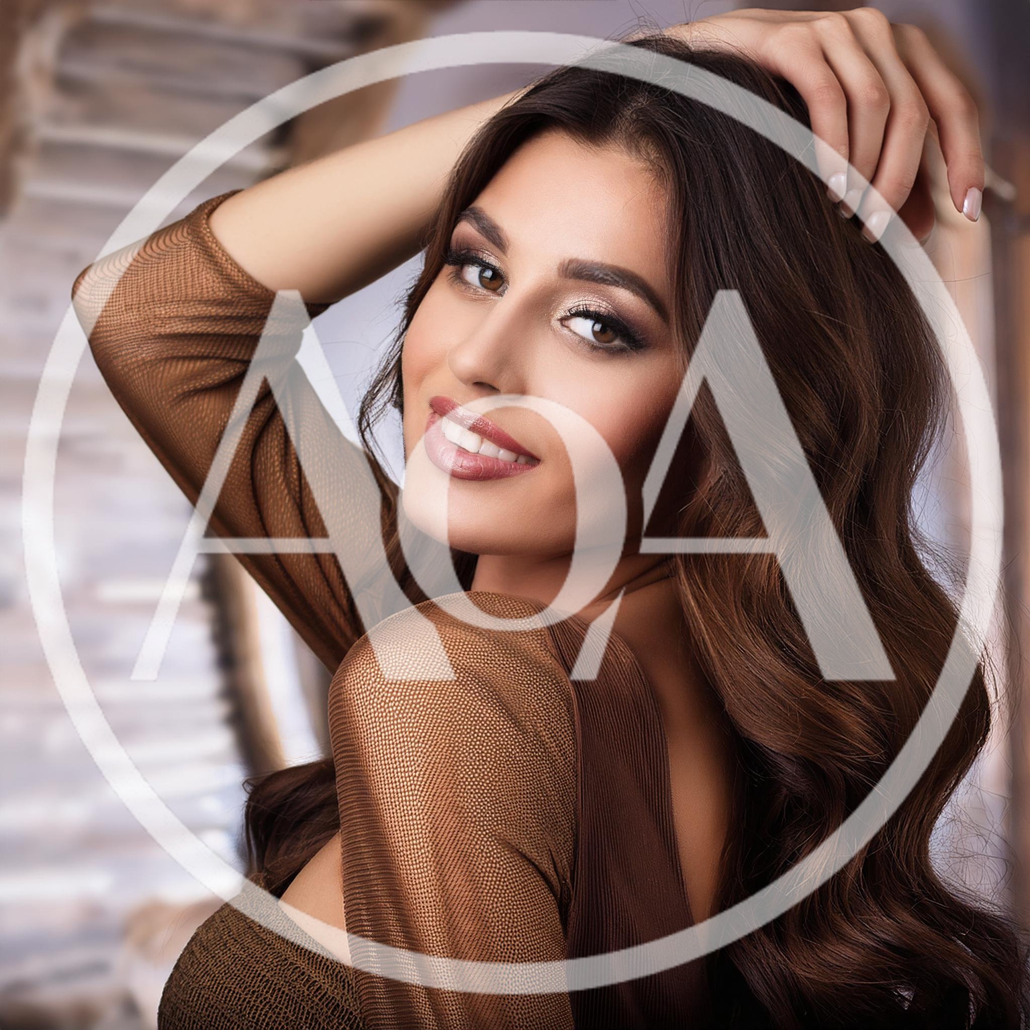Portrait Of A Beautiful Woman With Wavy Brown Hair